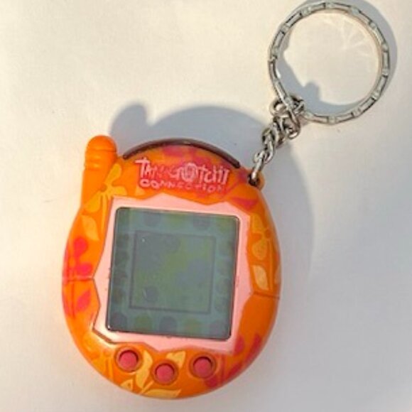 Tamagotchi Connection v3 Orange Flowers Design Tested and Working - Picture 1 of 6